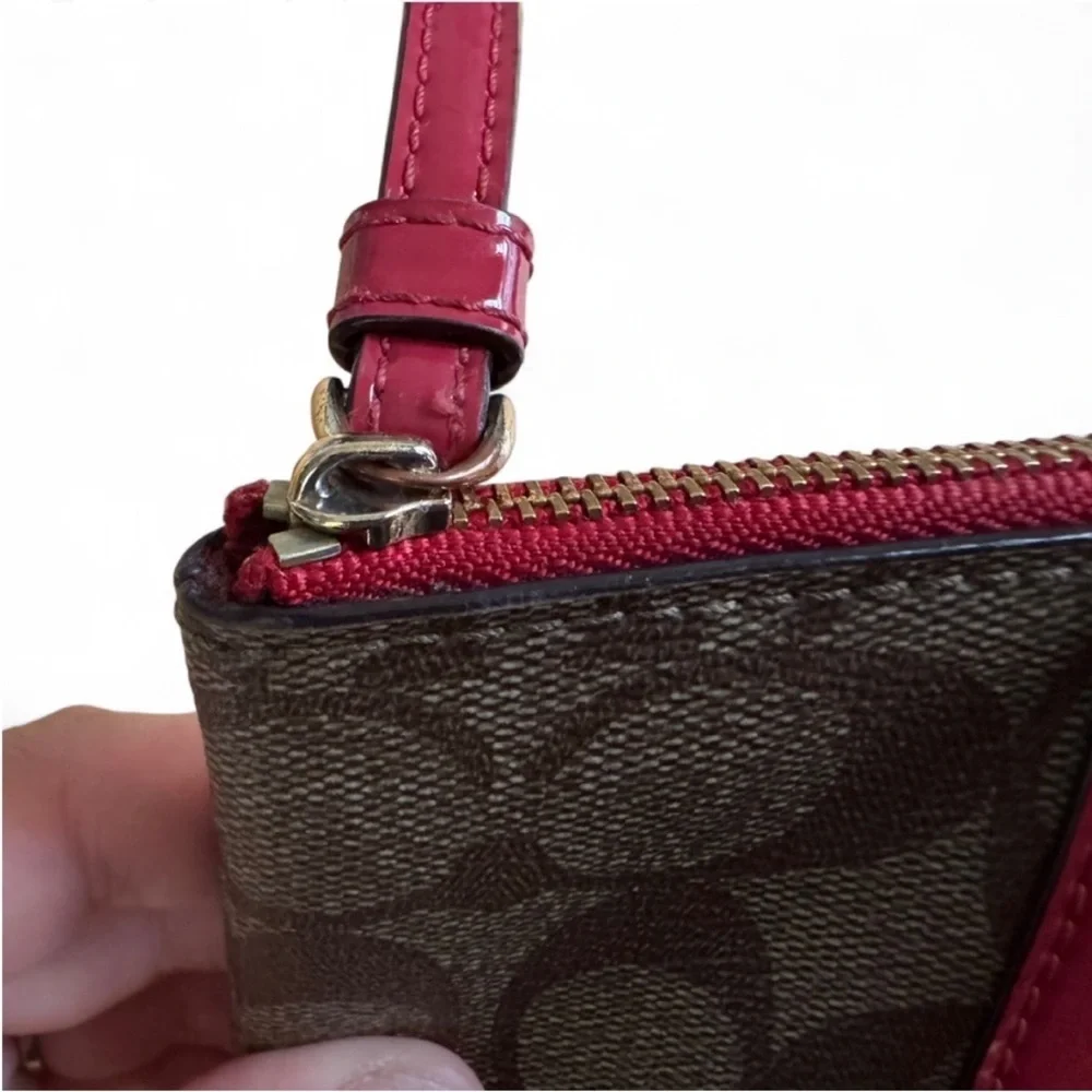 Coach Signature wristlet in light Brown and Red